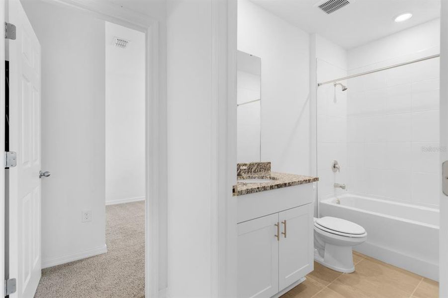 Furnished interior view inside a new home in Lawson Dunes - Signature Series, Haines City (Image 12).