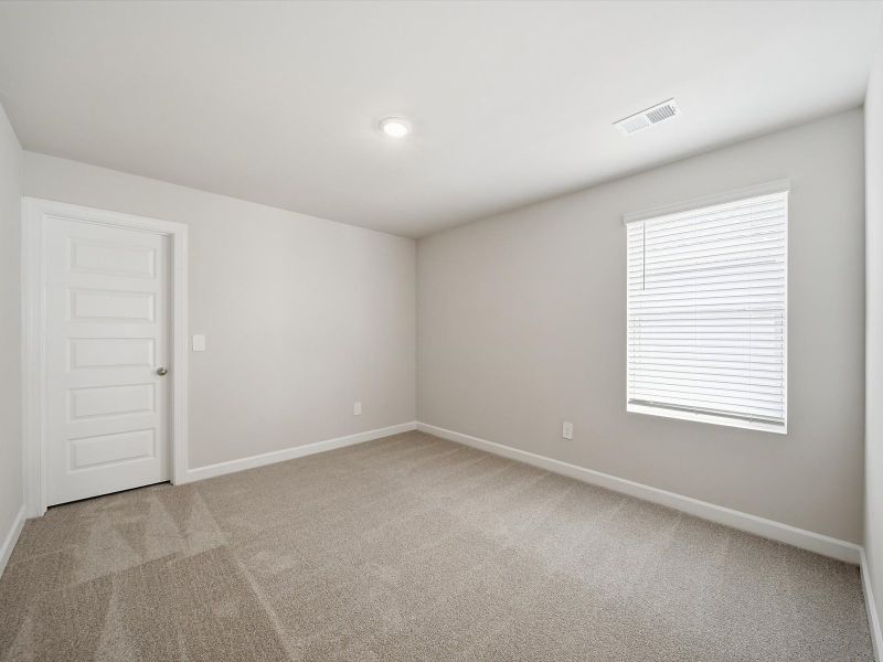 Spacious, unfurnished interior of a new home in The Farm at Wells Creek - Signature Collection, Gray Court (Image 20).