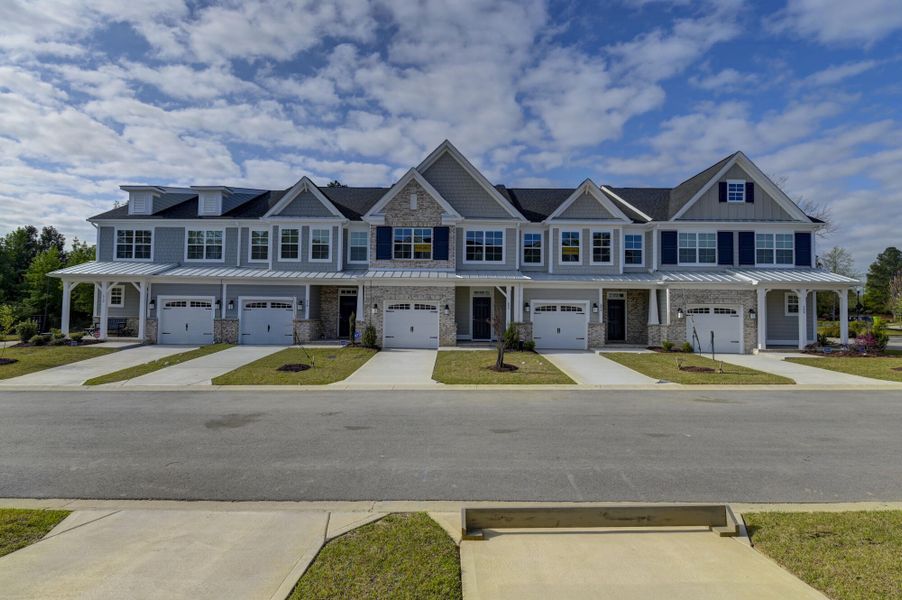 Front exterior of a new home in Lake Carolina Townhomes, Columbia, SC, highlighting curb appeal (Image 30).
