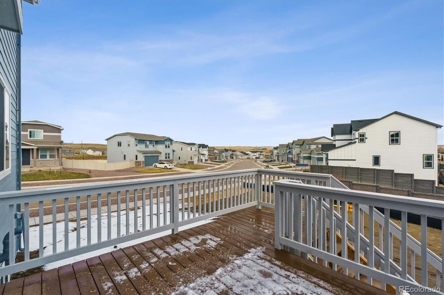 Front exterior of a new home in Bradley Heights, Colorado Springs, CO, highlighting curb appeal (Image 15).