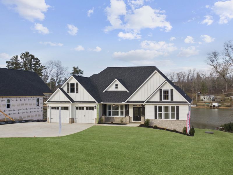 Front exterior of a home in the Lakeside at Blue Ridge Plantation community, located in Taylors, SC (Image 13).