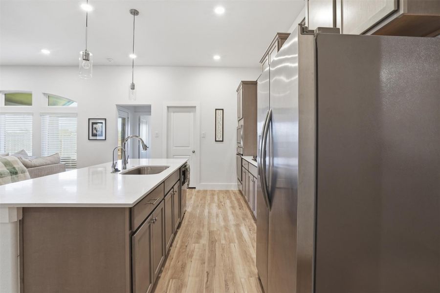 luxury vinyl plank flooring and modern kitchen