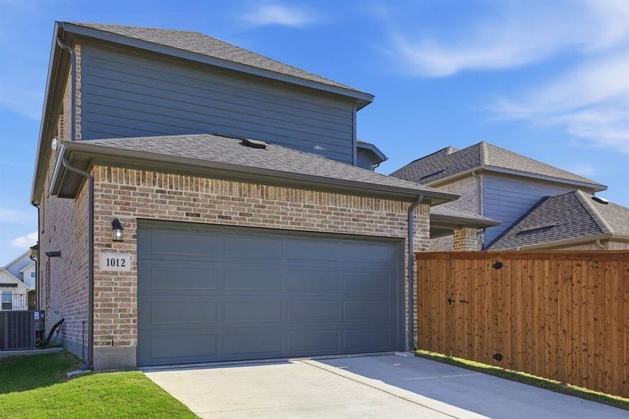 Exterior details and patio area of a home in The Ranch at Uptown Celina 40s, Celina (Image 19). Exterior details and patio area of a home in The Ranch at Uptown Celina 40s, Celina (Image 19).