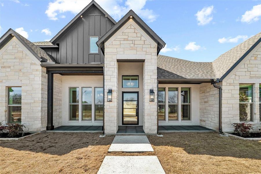 Front exterior of a new home in , Aledo, TX, highlighting curb appeal (Image 24).