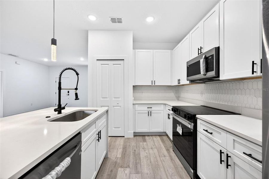 Furnished interior view inside a new home in , North Port (Image 9).