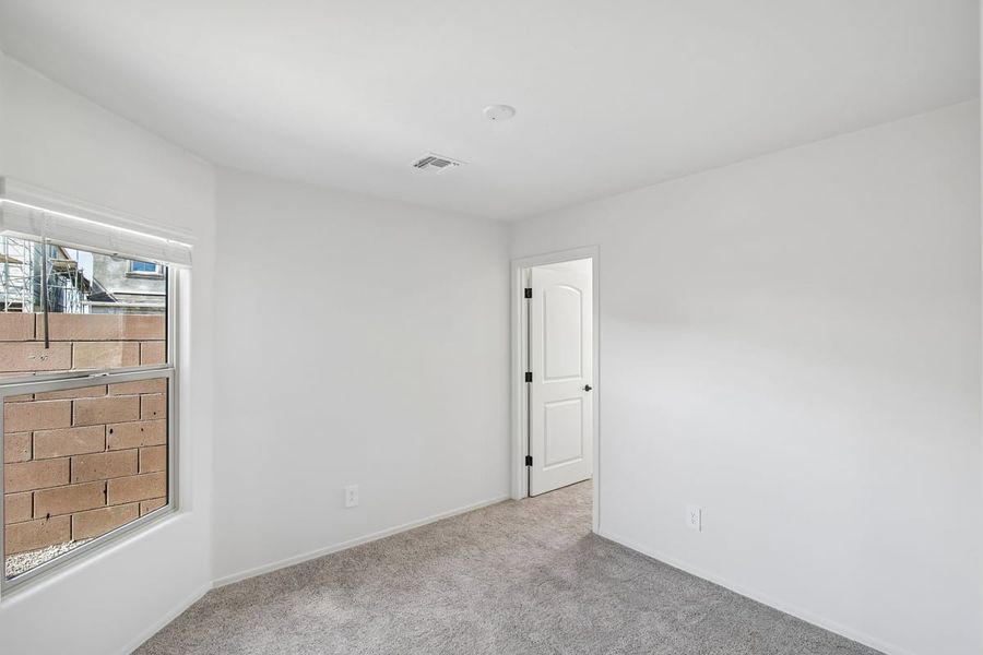 Spacious, unfurnished interior of a new home in The Landings at Rancho Del Lago, Vail (Image 12).