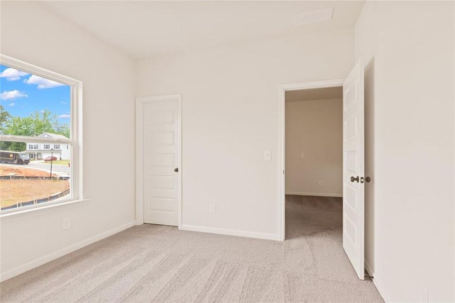 Spacious, unfurnished interior of a new home in Roxeywood Park, Winder (Image 27).