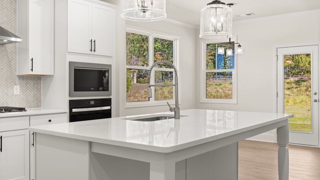 Representative furnished interior of a home built from the WINDSOR by D.R. Horton in Butner Estates, South Fulton (Image 8).