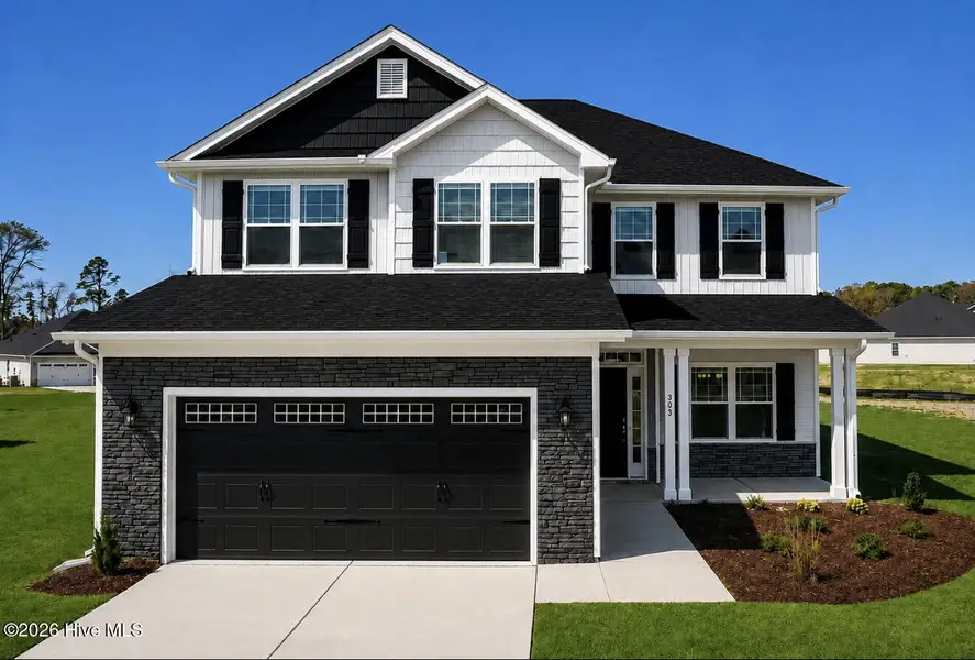 Front exterior of a new home in Longneedle, Rocky Mount, NC, highlighting curb appeal (Image 1). Front exterior of a new home in Longneedle, Rocky Mount, NC, highlighting curb appeal (Image 1).