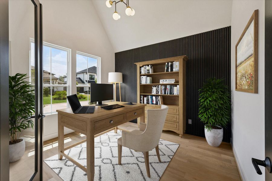 Study/Office found off Foyer. On trend accent wall. This photo has been virtually staged.