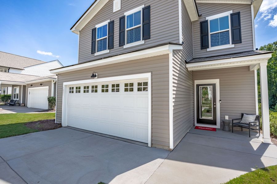 Exterior details and patio area of a home in Grand Arbor, Blythewood (Image 29).