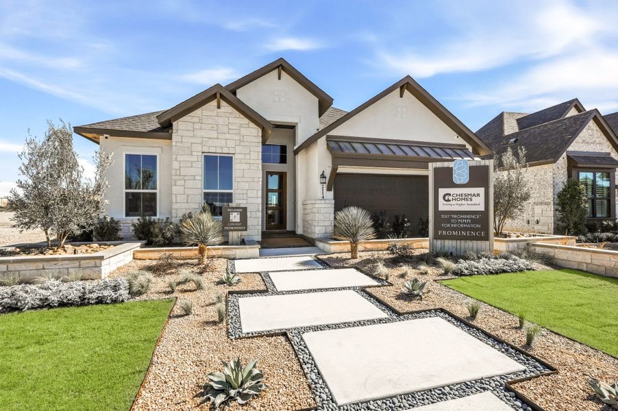 Front exterior of a new home in Prominence, San Antonio, TX, highlighting curb appeal (Image 28).