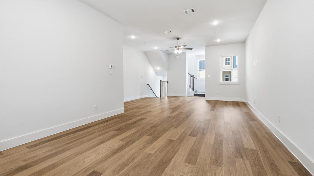 Furnished interior view inside a new home in Collin Creek, Plano (Image 22).
