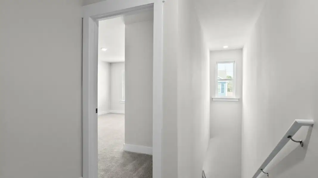 Spacious, unfurnished interior of a new home in The Townes at Cedar Hill Landing, Navassa (Image 17).