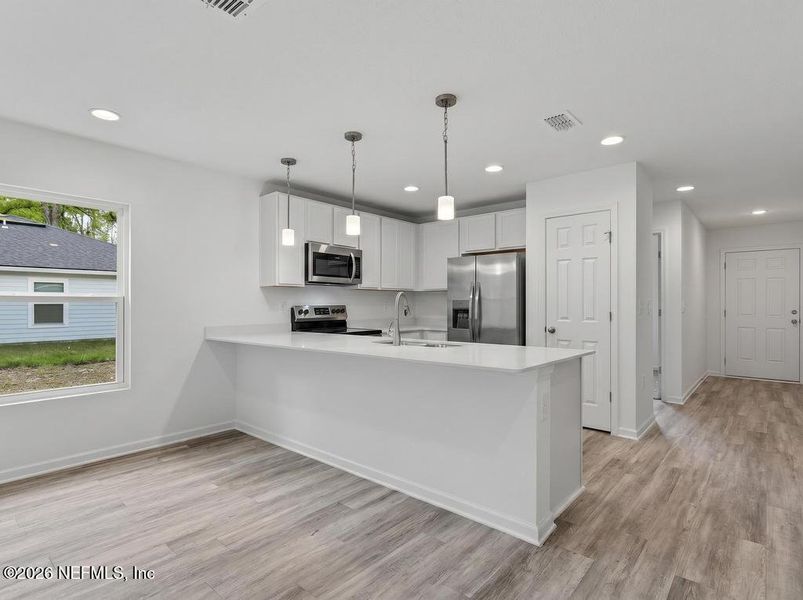 Furnished interior view inside a new home in , Jacksonville (Image 6).