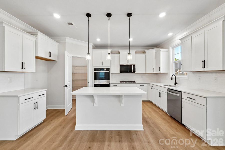 Furnished interior view inside a new home in Sylvan Creek, Denver (Image 5).