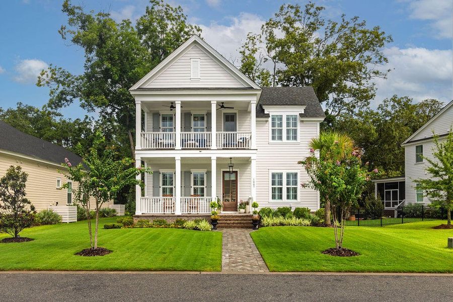 Front exterior of a new home in The Settlement at Ashley Hall, Charleston, SC, highlighting curb appeal (Image 2). Front exterior of a new home in The Settlement at Ashley Hall, Charleston, SC, highlighting curb appeal (Image 2).