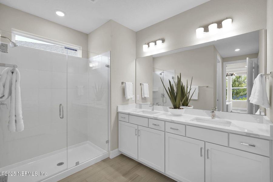 Furnished interior view inside a new home in Summer Bay at Grand Oaks, St. Augustine (Image 9).