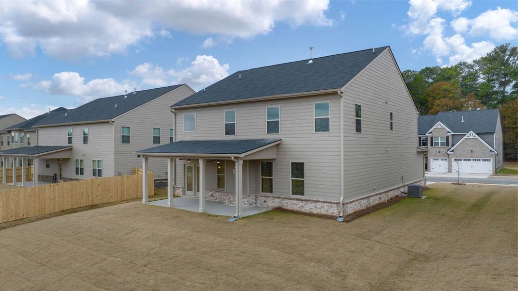 Front exterior of a new home in Water Oak Estates, Lawrenceville, GA, highlighting curb appeal (Image 21).