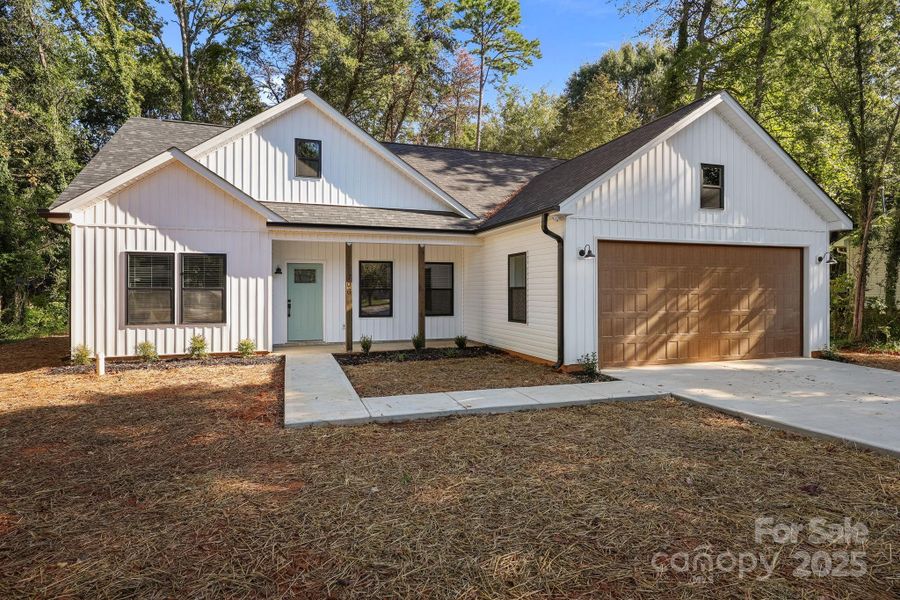 Front exterior of a new home in , Granite Quarry, NC, highlighting curb appeal (Image 17). Front exterior of a new home in , Granite Quarry, NC, highlighting curb appeal (Image 17).