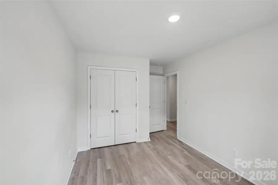 Spacious, unfurnished interior of a new home in , Iron Station (Image 28).
