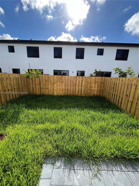 Front exterior of a new home in , Miami, FL, highlighting curb appeal (Image 13).