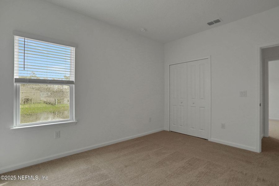 Spacious, unfurnished interior of a new home in TrailMark, St. Augustine (Image 28).