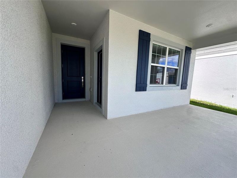 Exterior details and patio area of a home in Bridgewalk, St. Cloud (Image 3).