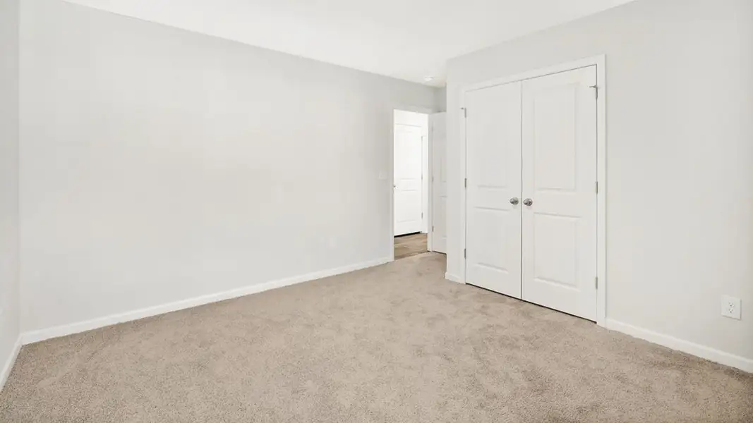 Spacious, unfurnished interior of a new home in Indigo Preserve Townhomes, Leland (Image 26).