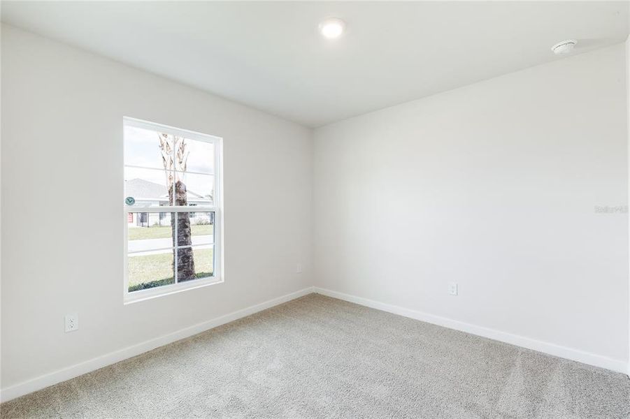 Spacious, unfurnished interior of a new home in Central Parc, North Port (Image 13).