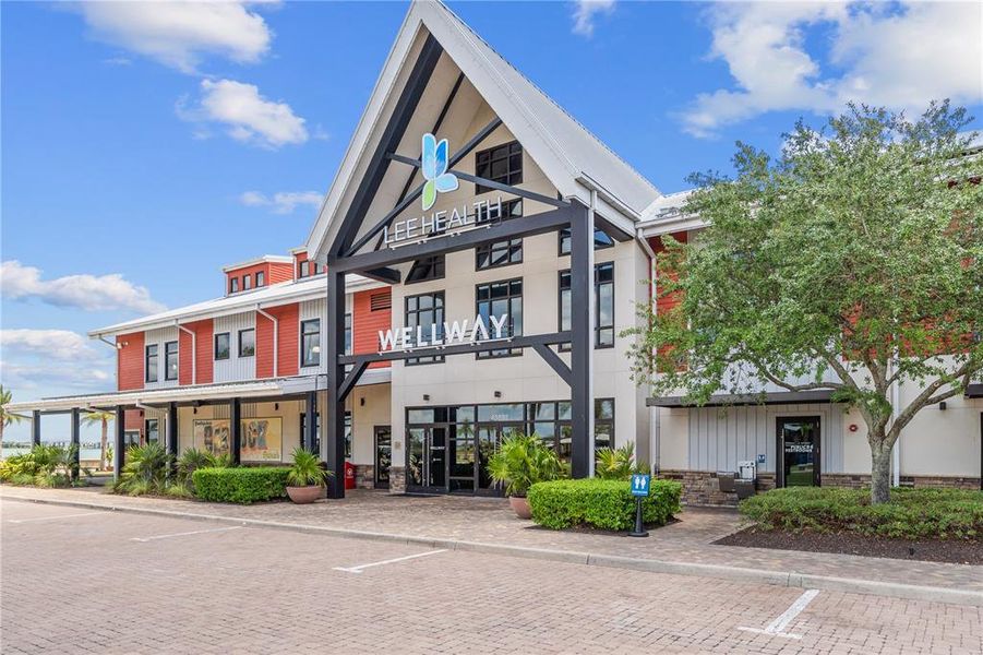 Front exterior of a new home in Tuckers Cove: Villas, Punta Gorda, FL, highlighting curb appeal (Image 21).