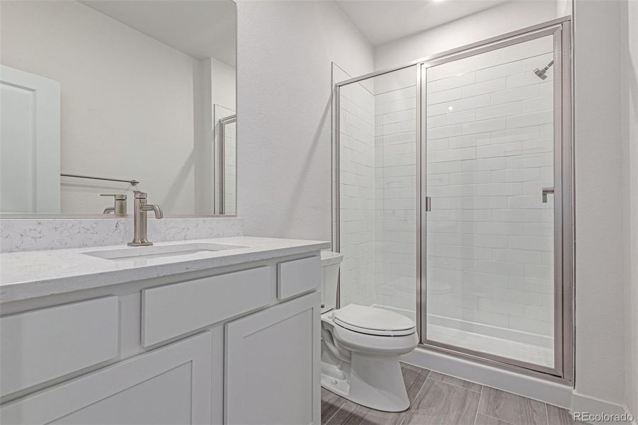 Furnished interior view inside a new home in Ascent at Inverness, Englewood (Image 6).