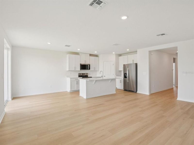 Spacious, unfurnished interior of a new home in The Grove at Stuart Crossing - Classic Series, Bartow (Image 17).