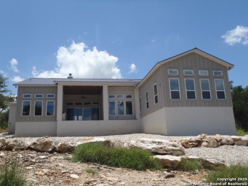 Front exterior of a new home in , New Braunfels, TX, highlighting curb appeal (Image 1). Front exterior of a new home in , New Braunfels, TX, highlighting curb appeal (Image 1).
