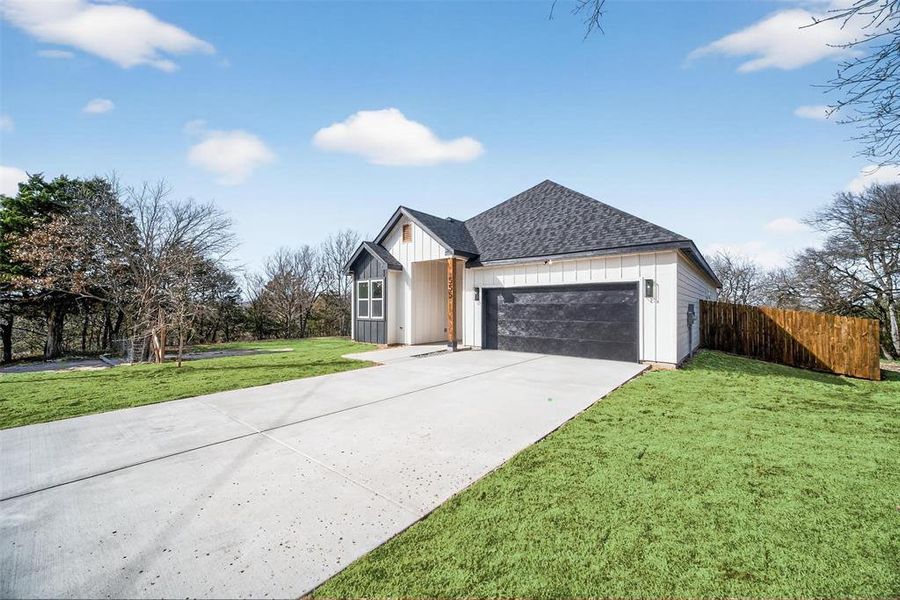 Front exterior of a new home in , Dallas, TX, highlighting curb appeal (Image 27).