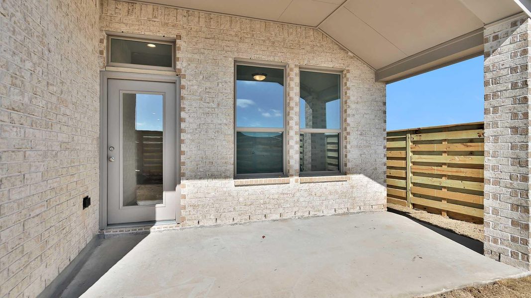 Exterior details and patio area of a home in Austin Point, Richmond (Image 3).