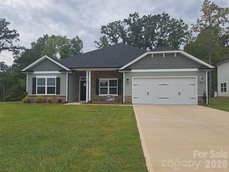 Front exterior of a new home in Kerns Ridge, Salisbury, NC, highlighting curb appeal (Image 1). Front exterior of a new home in Kerns Ridge, Salisbury, NC, highlighting curb appeal (Image 1).
