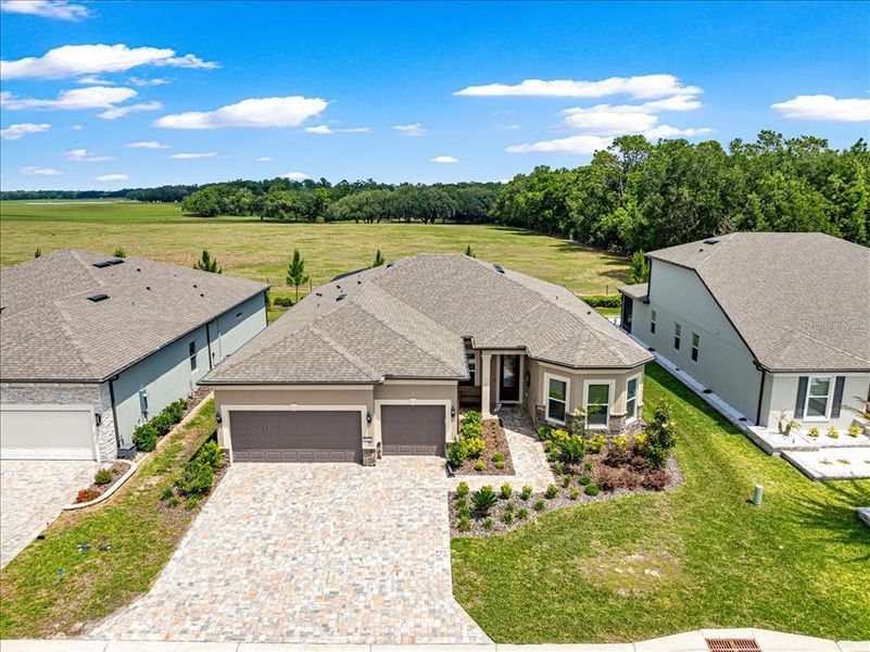 Front exterior of a new home in , Ocala, FL, highlighting curb appeal (Image 22).