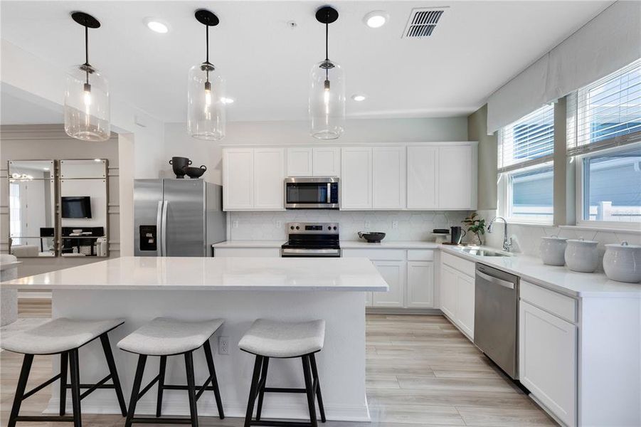 Furnished interior view inside a new home in EverBe, Orlando (Image 7).