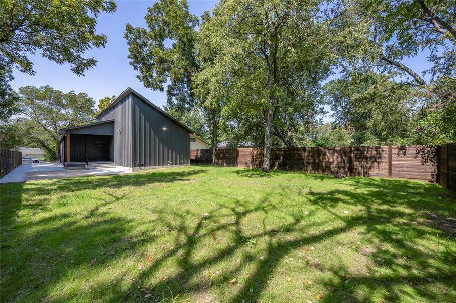 View of fenced backyard