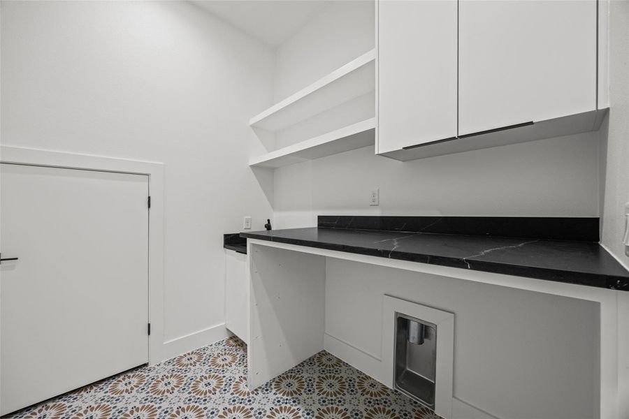 Laundry room with cabinet space Laundry room with cabinet space