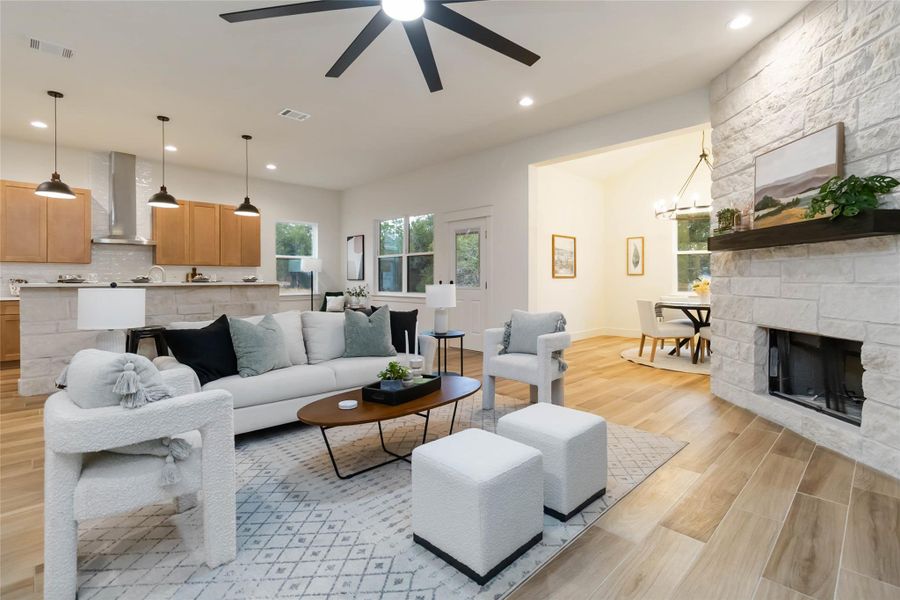 Living room with stone accent fireplace Living room with stone accent fireplace