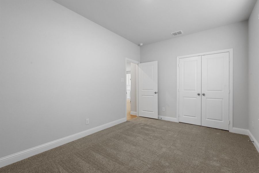 Representative unfurnished interior of a home built from the Garrison I by Cheldan Homes in Stoneview, Glen Rose (Image 24).