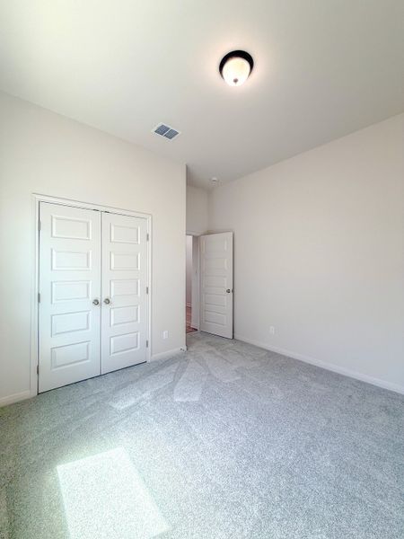 Spacious, unfurnished interior of a new home in TerraVista, Victoria (Image 37).