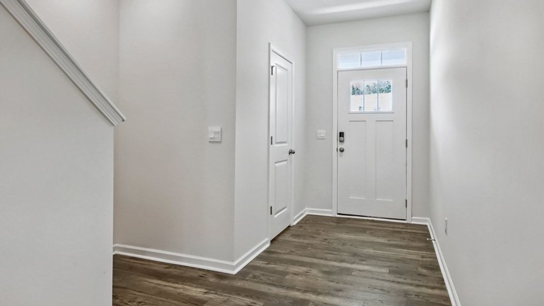 Representative unfurnished interior of a home built from the DANIEL by D.R. Horton in The Townes Park, Apex (Image 10). Representative unfurnished interior of a home built from the DANIEL by D.R. Horton in The Townes Park, Apex (Image 10).