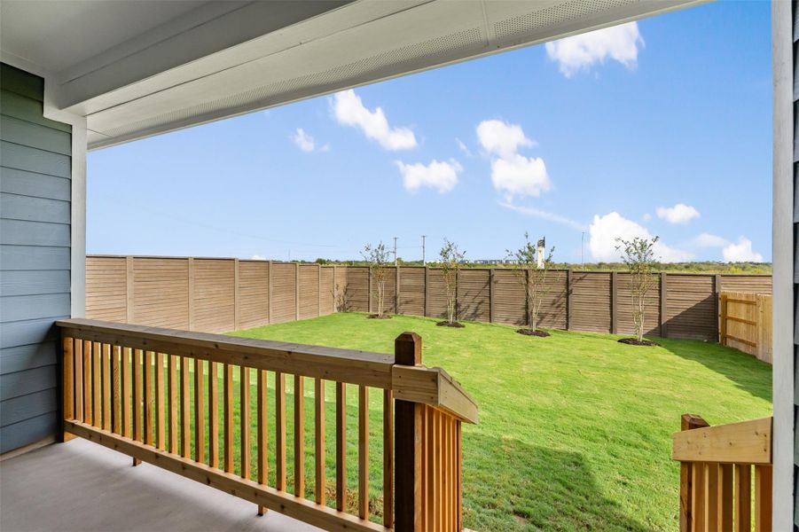 Exterior details and patio area of a home in Willow Springs, Buda (Image 1).