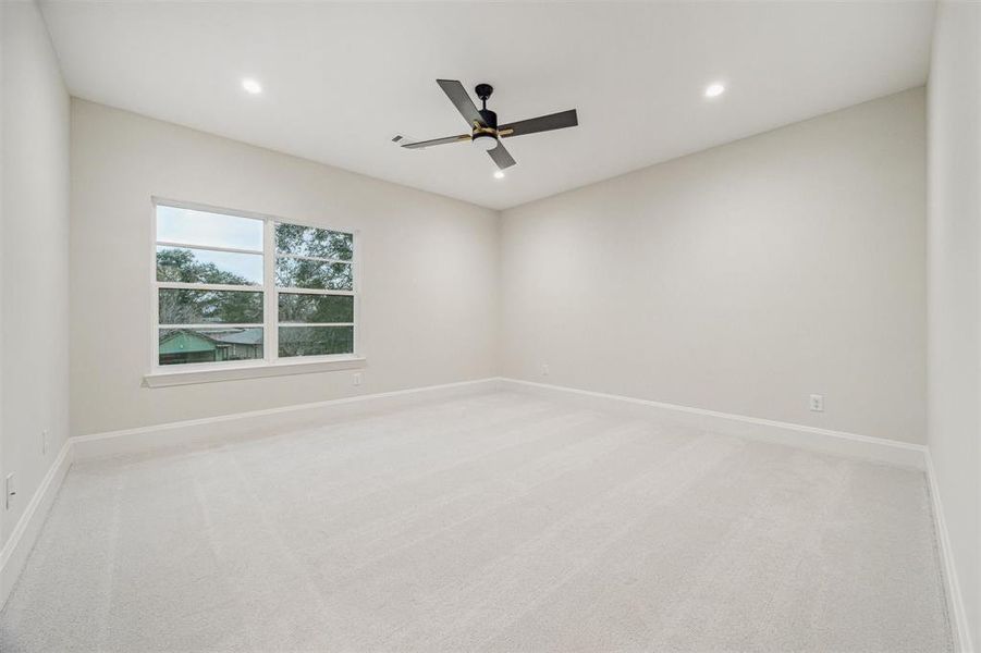 One of four secondary bedrooms upstairs