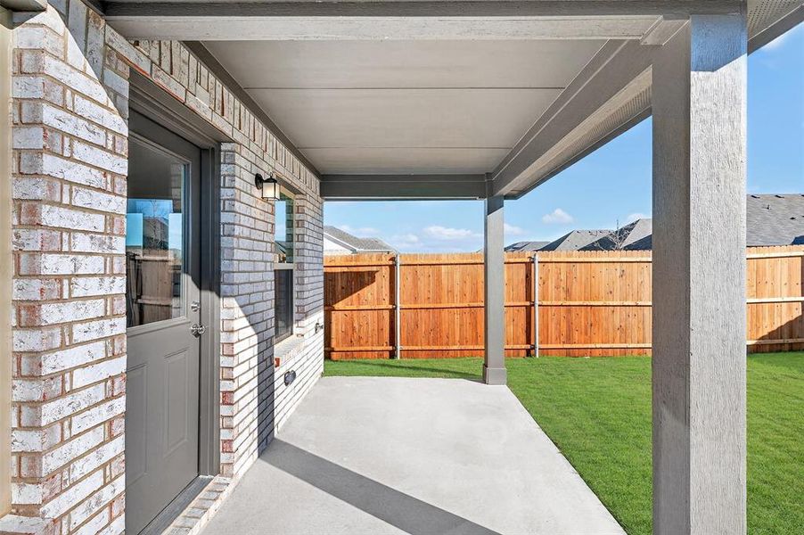 Exterior details and patio area of a home in Verandah, Royse City (Image 3).