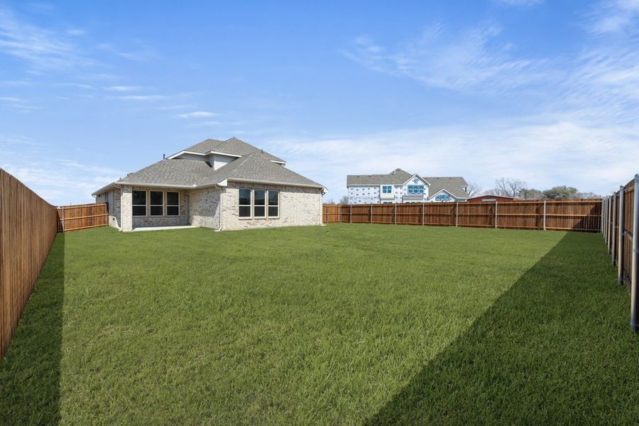 Exterior details and patio area of a home in Park Trails, Forney (Image 6).