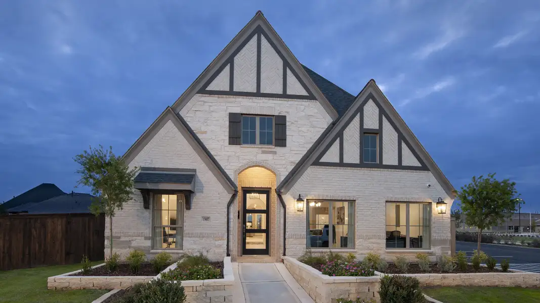 Front exterior of a new home in Silo Mills, Cleburne, TX, highlighting curb appeal (Image 24). Front exterior of a new home in Silo Mills, Cleburne, TX, highlighting curb appeal (Image 24).